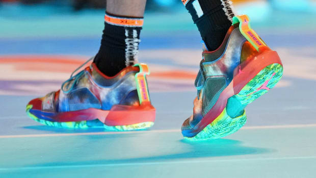 Jacob Toppin's blue and orange Air Jordan sneakers from the NBA Slam Dunk Contest.